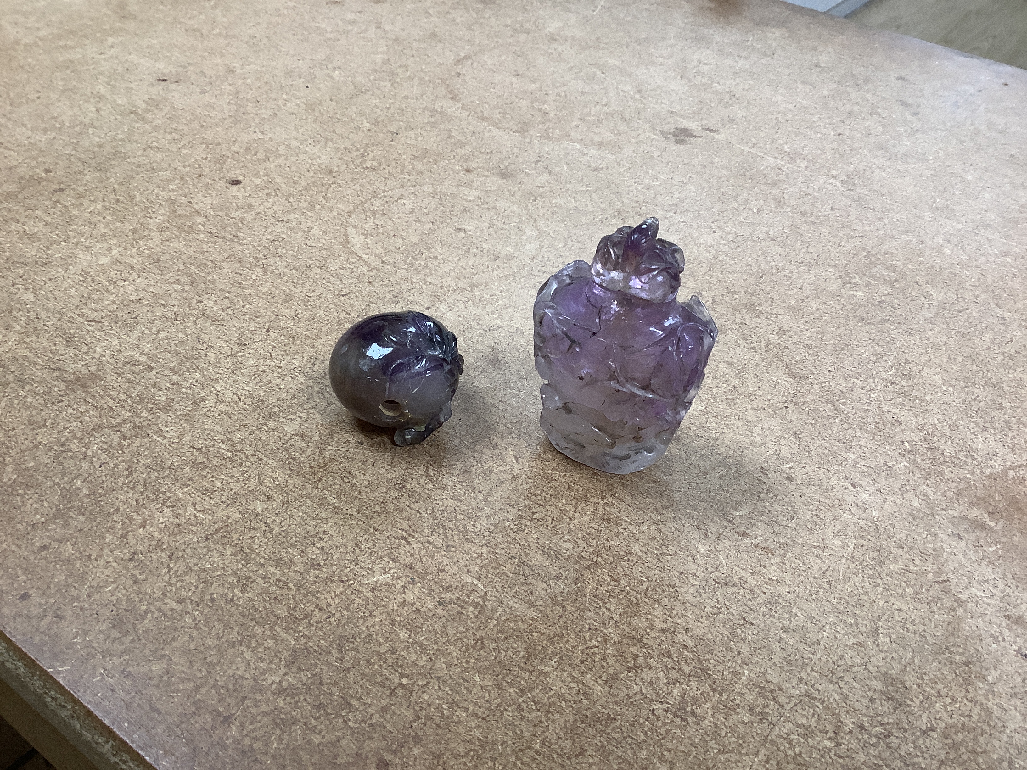 Two Chinese carved amethyst quartz scent bottles, two similar chalcedony snuff bottles, soapstone dishes, carvings etc